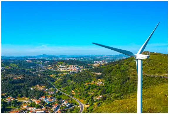 Wind turbine in the green hills.